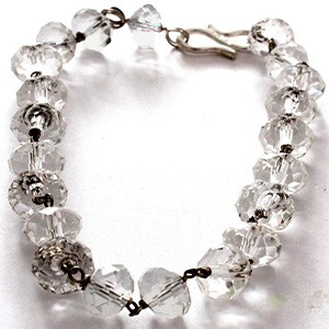 A lucky charm bracelet made of faceted crystal beads